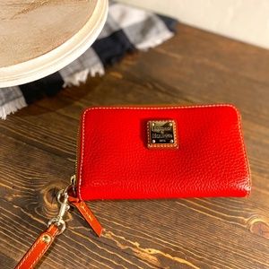 Dooney and Bourke Pebble Grain Clutch Wristlet in Red